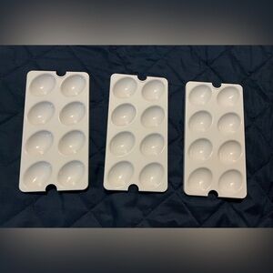 3 NEW Tupperware deviled egg holders/inserts.